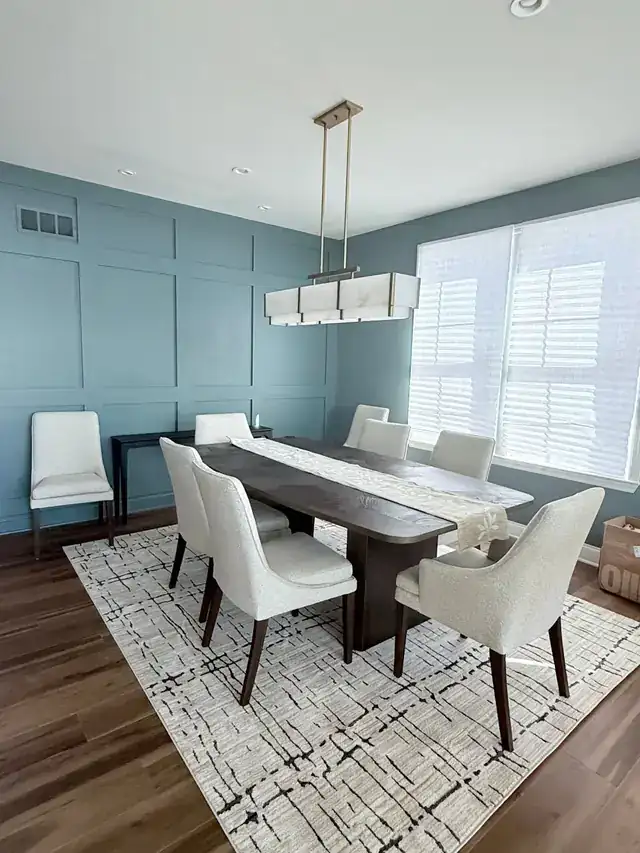 Dining room with a blue-grey board-and-batten wall
