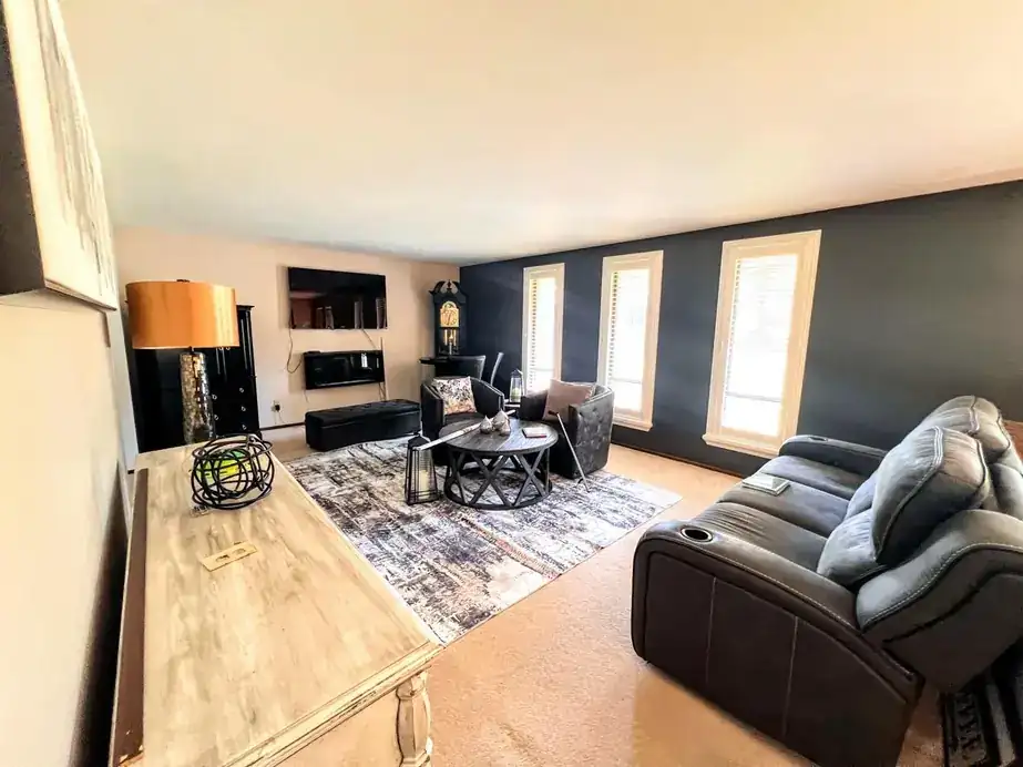 Living room with a navy accent wall